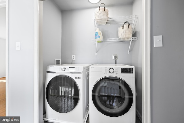 laundry area with washer and clothes dryer