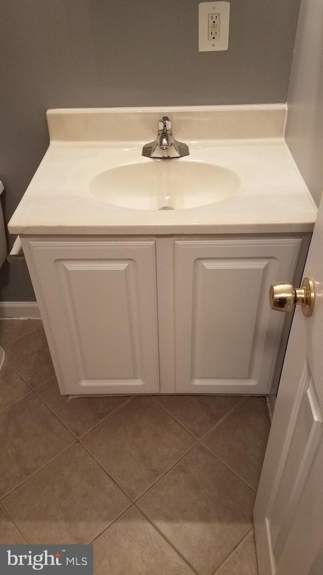 bathroom featuring vanity and tile patterned floors