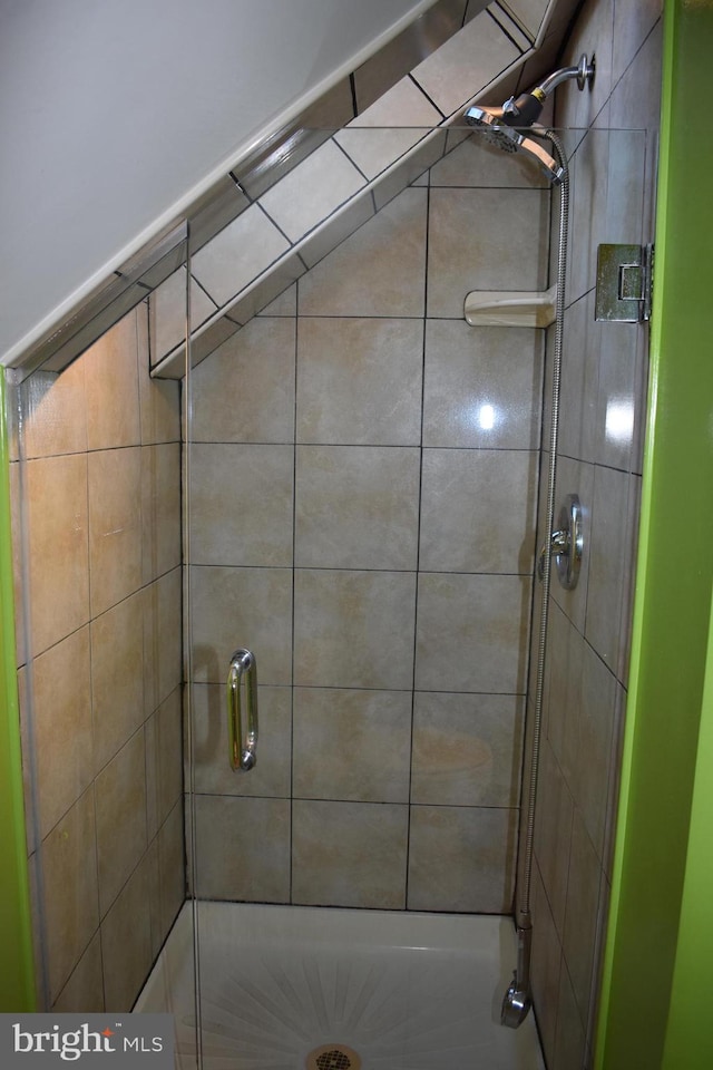 bathroom with a shower stall