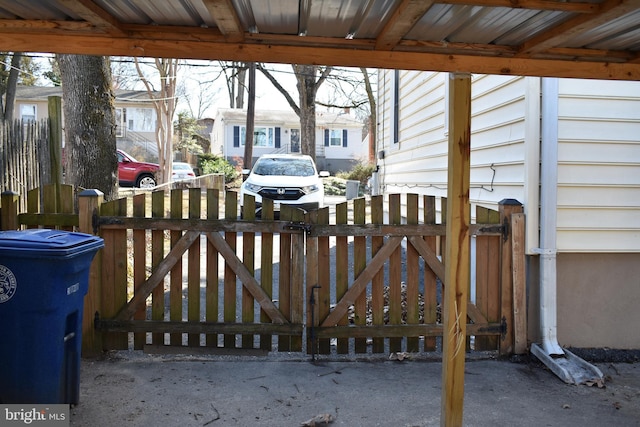 exterior space featuring a gate and fence