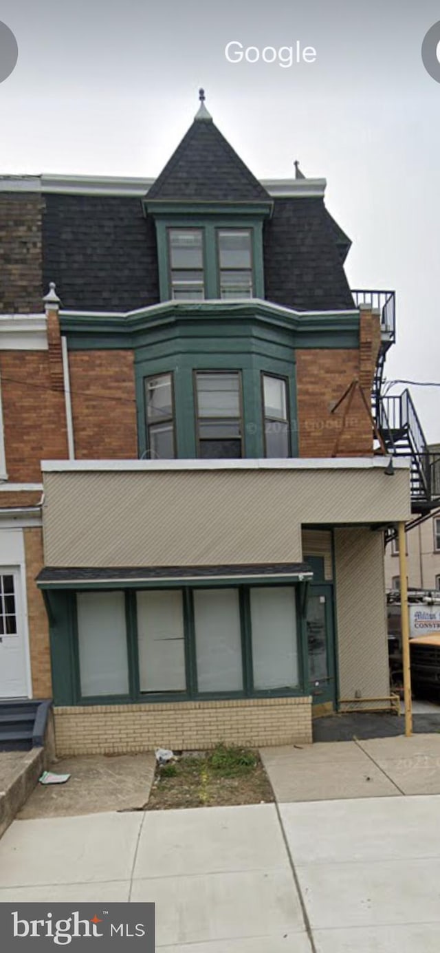 view of front of property with brick siding