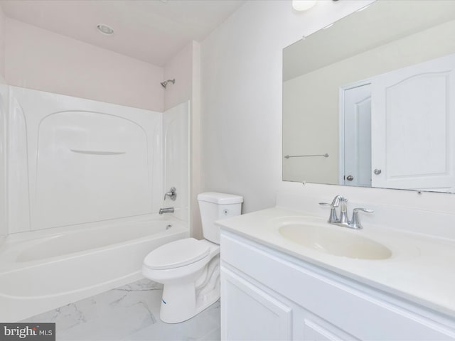 full bathroom featuring marble finish floor, shower / bath combination, vanity, and toilet