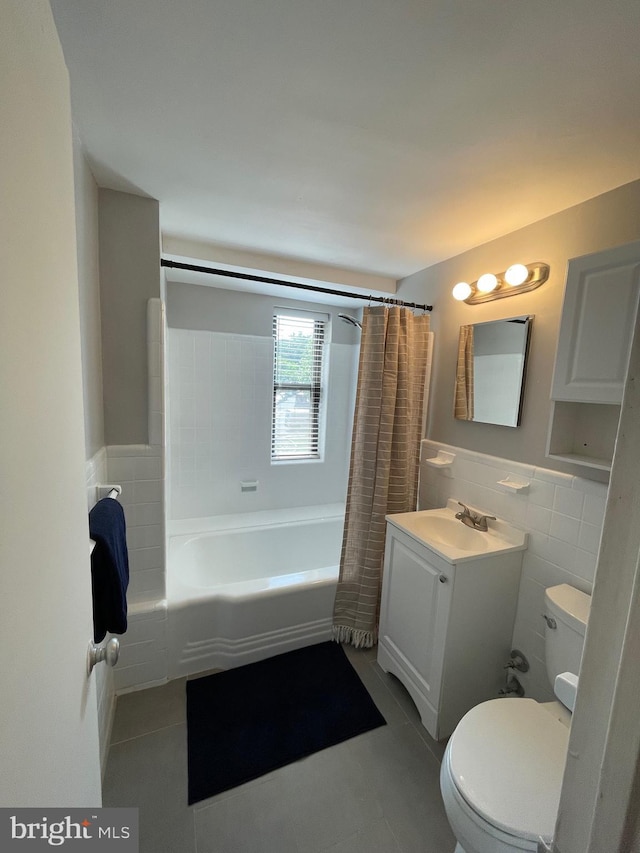 3701 Connecticut Ave NW Unit 311, Washington, DC 20008 - bathroom with toilet, tile walls, vanity, tile patterned floors, and shower / tub combo with curtain