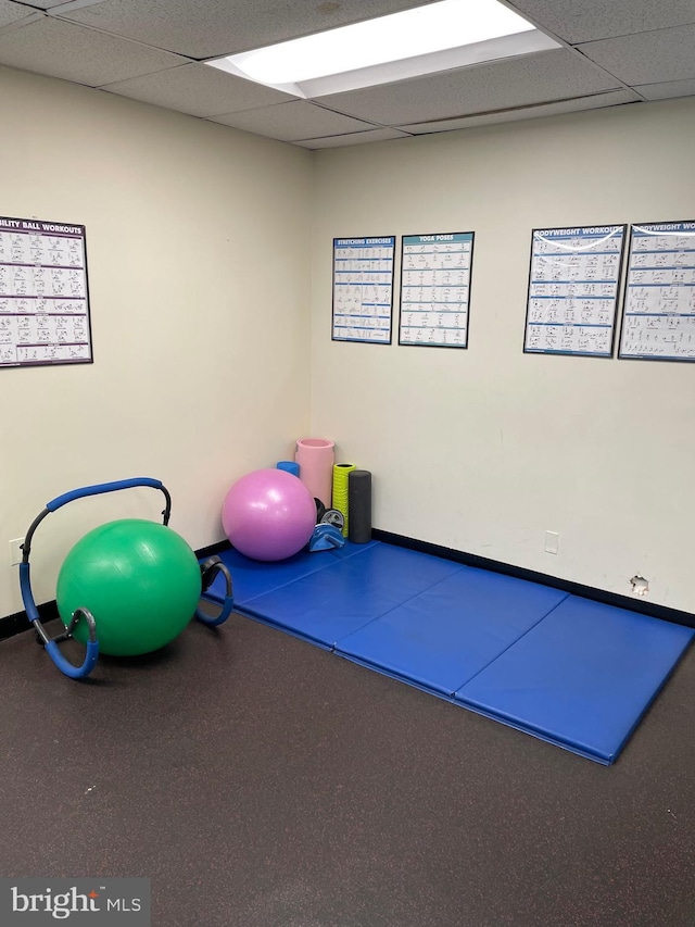 3701 Connecticut Ave NW Unit 311, Washington, DC 20008 - exercise area featuring a paneled ceiling and baseboards