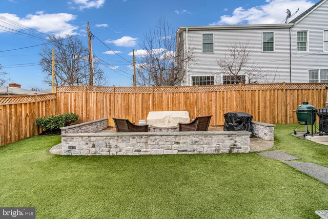 view of yard with a fenced backyard