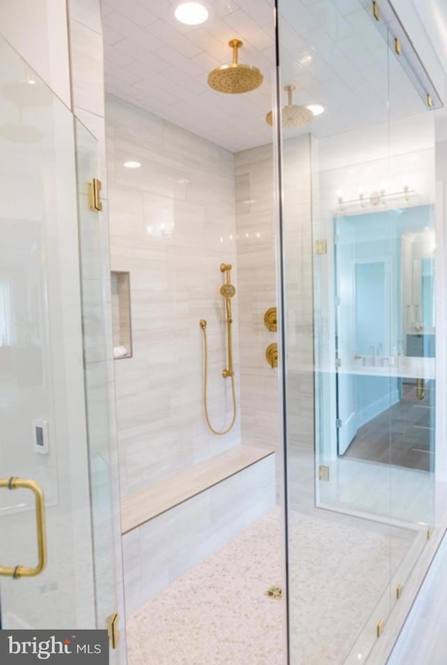 bathroom featuring a shower stall