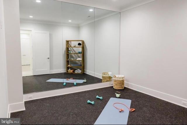 exercise room featuring baseboards and recessed lighting