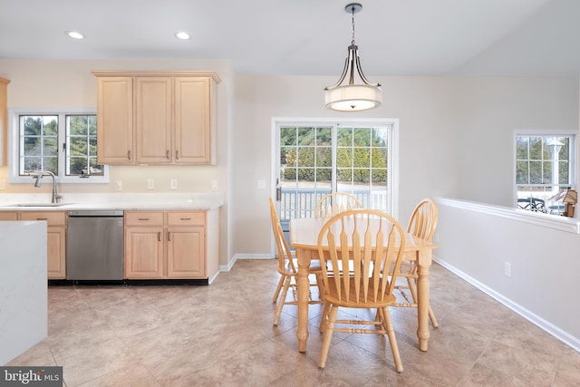 dining area with baseboards and recessed lighting