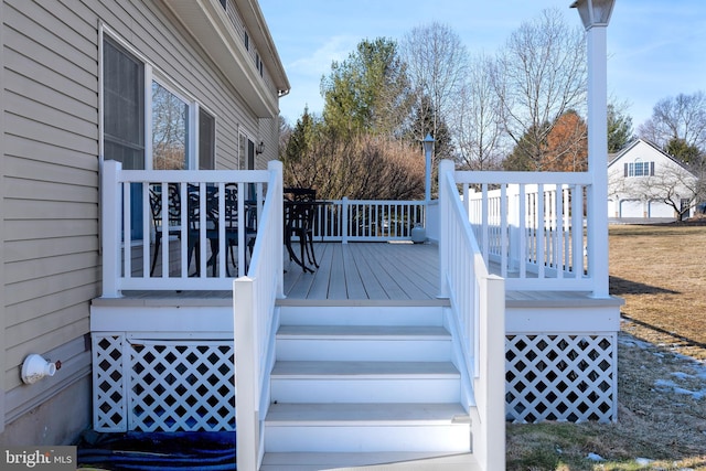 deck featuring stairs