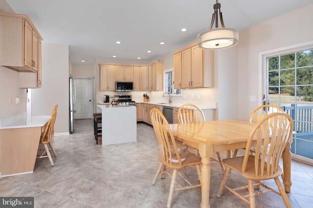 dining area with recessed lighting