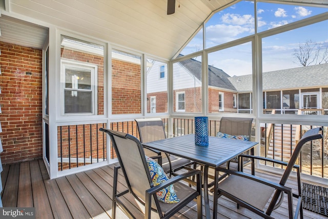 sunroom with vaulted ceiling