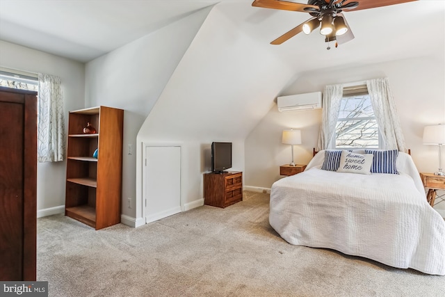 bedroom with carpet flooring, lofted ceiling, a wall mounted AC, and baseboards