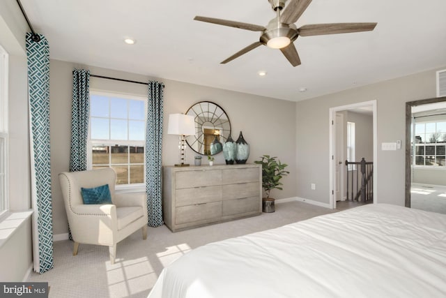 bedroom with light carpet, baseboards, a ceiling fan, and recessed lighting