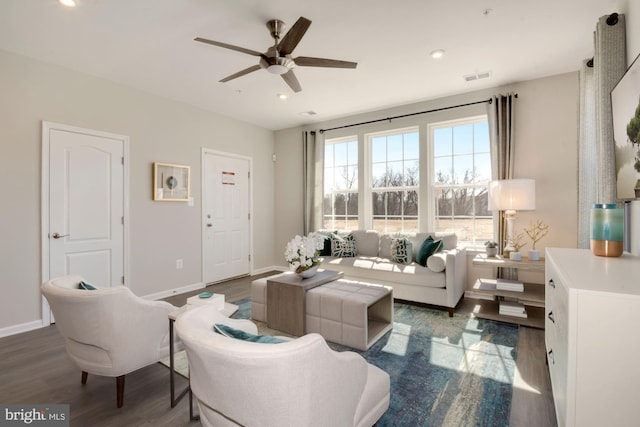 living room with dark wood-style floors, recessed lighting, visible vents, a ceiling fan, and baseboards