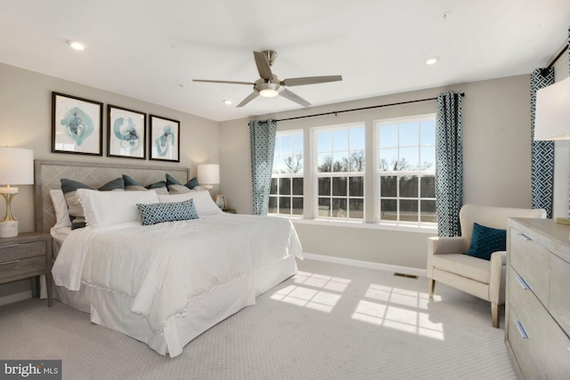 bedroom featuring recessed lighting, visible vents, light carpet, ceiling fan, and baseboards