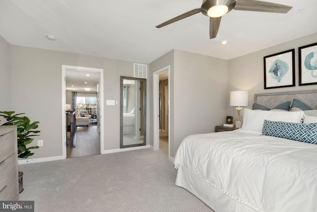 bedroom featuring light carpet, baseboards, visible vents, a ceiling fan, and recessed lighting