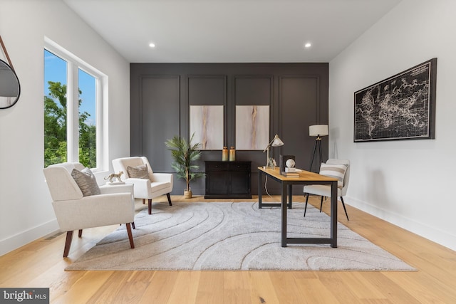 office area featuring baseboards, wood finished floors, and recessed lighting