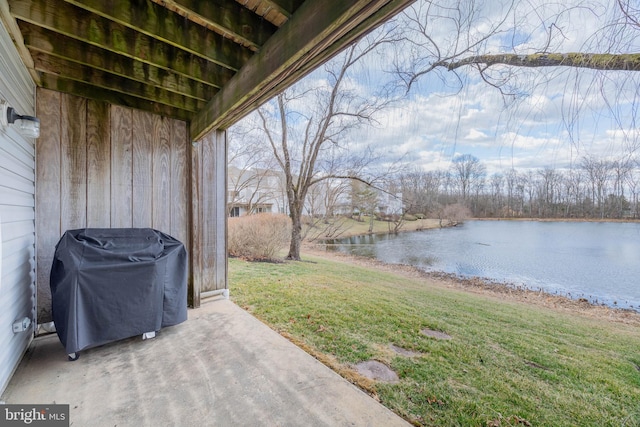 exterior space with a water view