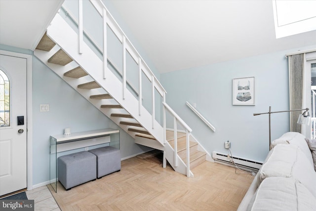 14 Buckingham Ave, Harvey Cedars, NJ 08008 - stairs featuring a baseboard radiator, baseboards, and a skylight