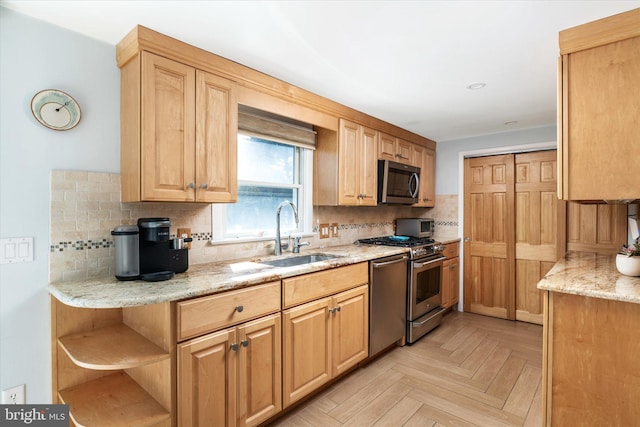 14 Buckingham Ave, Harvey Cedars, NJ 08008 - kitchen with tasteful backsplash, light stone counters, stainless steel appliances, open shelves, and a sink