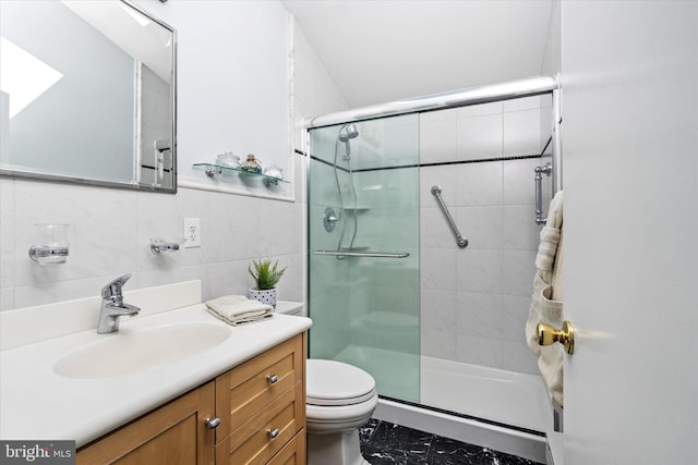 14 Buckingham Ave, Harvey Cedars, NJ 08008 - bathroom featuring a stall shower, vanity, and toilet