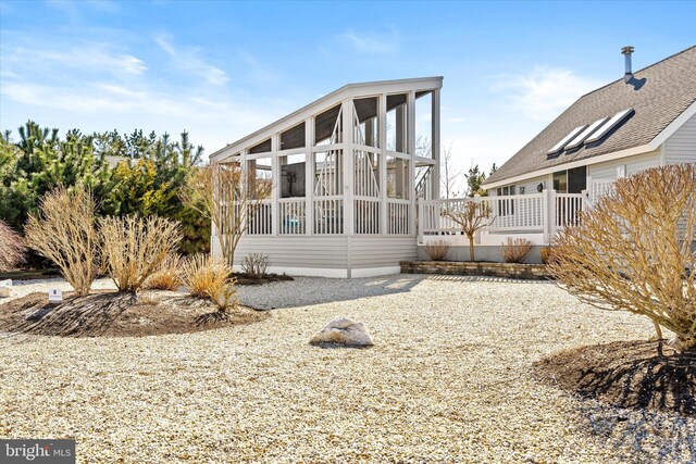 14 Buckingham Ave, Harvey Cedars, NJ 08008 - exterior space with a sunroom