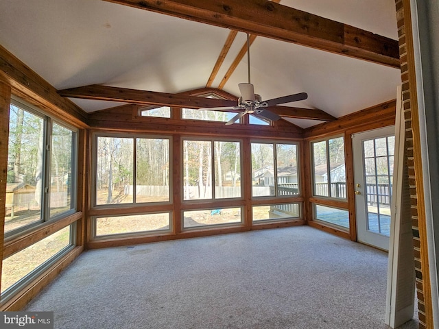 unfurnished sunroom featuring lofted ceiling with beams and a ceiling fan