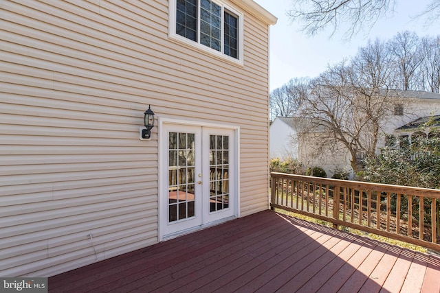 wooden terrace featuring french doors