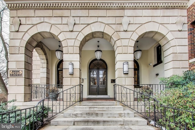 doorway to property with stone siding