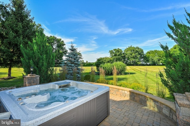 view of patio / terrace featuring a hot tub