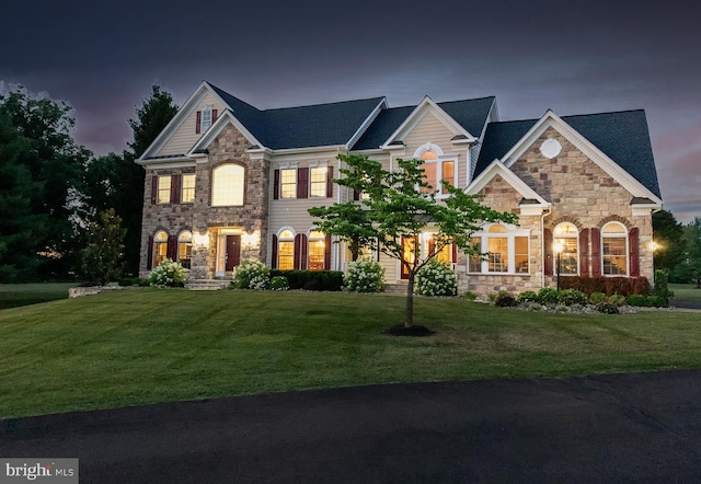 view of front of home featuring a front lawn