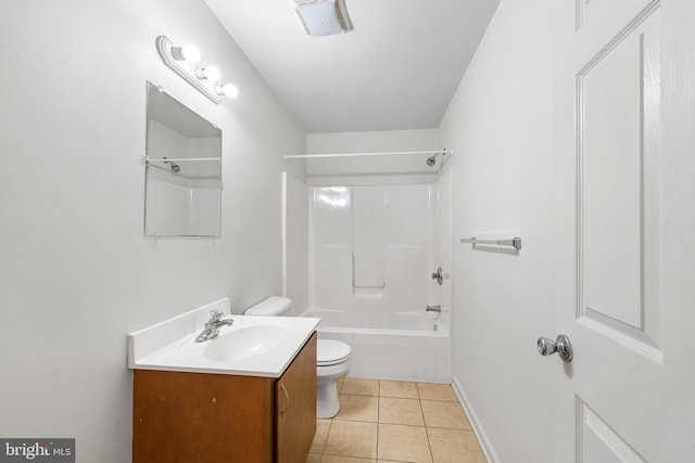 bathroom featuring bathtub / shower combination, toilet, vanity, baseboards, and tile patterned floors