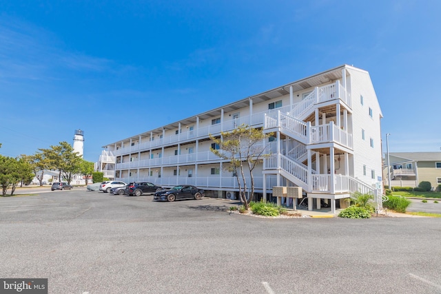 14501 Tunnel Ave Unit 10602, Ocean City, MD 21842 - view of building exterior featuring uncovered parking