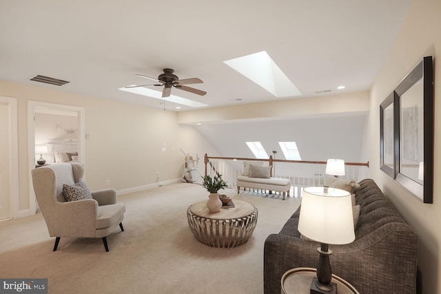 sitting room with carpet floors, baseboards, visible vents, and recessed lighting