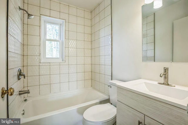 full bath featuring shower / bath combination, vanity, and toilet