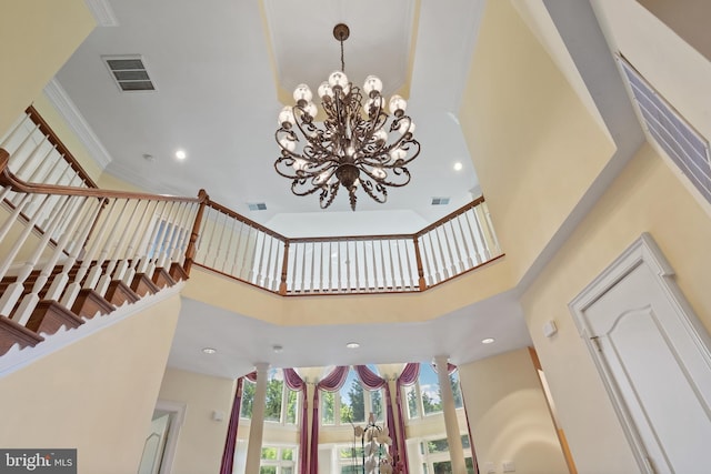 room details with ornamental molding, recessed lighting, and visible vents