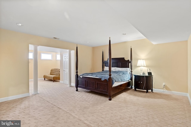 bedroom with carpet floors, baseboards, and visible vents