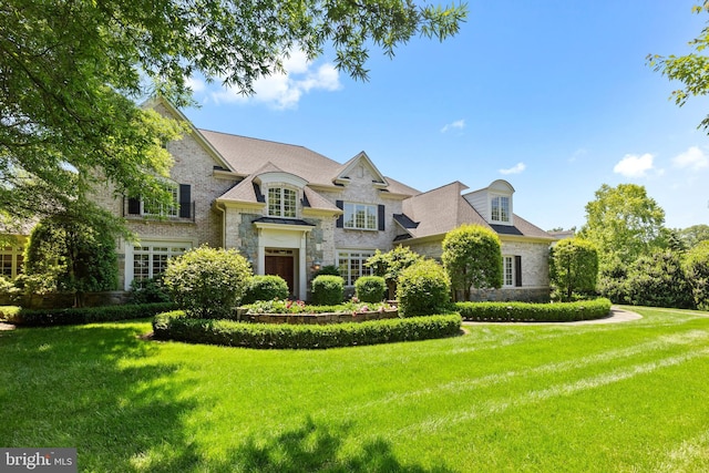 view of front of home with a front yard