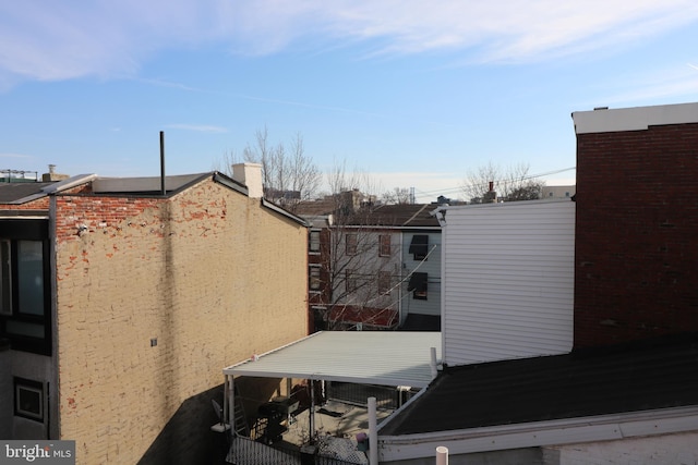 exterior space featuring a balcony