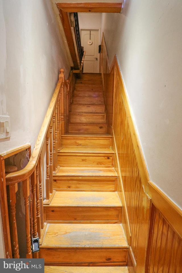 stairs with wainscoting