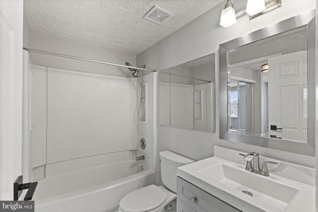 bathroom featuring a textured ceiling, toilet, shower / bath combination, vanity, and visible vents