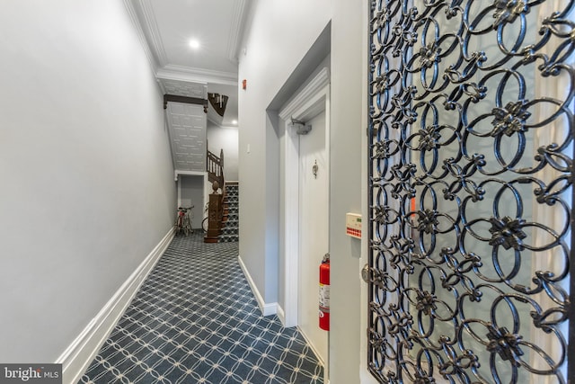 hallway with ornamental molding, recessed lighting, stairway, and baseboards