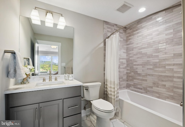 full bath with shower / tub combo with curtain, visible vents, toilet, vanity, and tile patterned flooring