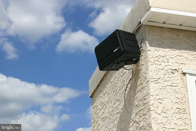 exterior details featuring stucco siding