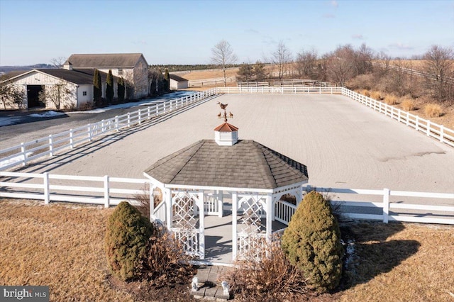 exterior space with a rural view