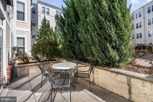 view of patio featuring outdoor dining space