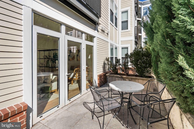 view of patio featuring outdoor dining space