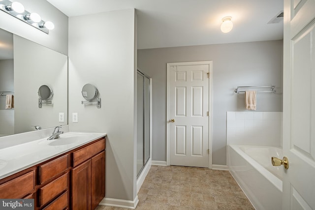 full bath with double vanity, visible vents, a sink, a shower stall, and a bath