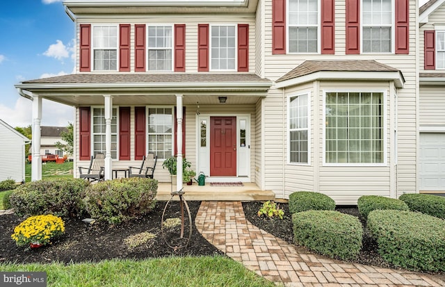 view of front of home featuring covered porch