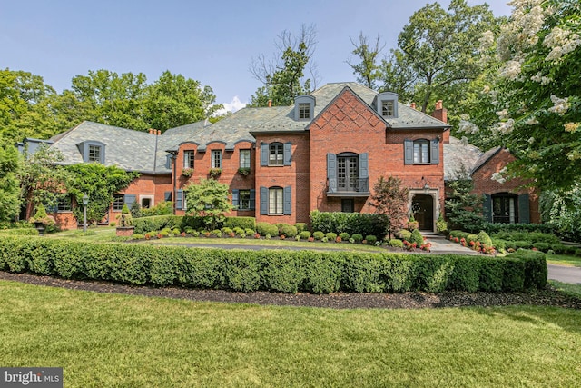1742 Stuart Rd W, Princeton, NJ 08540 - french country home with brick siding, a high end roof, and a front yard